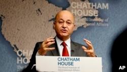 Presiden Irak Barham Salih saat memberikan pidato di Chatham House, London26 Juni 2019. (Foto: dok).,