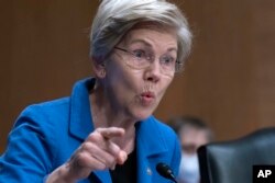 FILE — Sen. Elizabeth Warren, D-Mass., speaks during the Senate Committee on Banking, Housing and Urban Affairs on Capitol Hill in Washington, April 27, 2023.