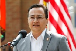 FILE - Cherokee Nation Principal Chief Chuck Hoskin Jr. speaks during a news conference in Tahlequah, Okla., Aug. 22, 2019.