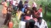 The water crisis is forcing most residents to fetch water from Mucheke River.