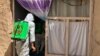 Lashkargah Municipality workers spraying in streets amidst covid19 outbreak