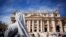 FILE - A nun waits for the arrival of Pope Francis for his weekly general audience, in St. Peter's Square at the Vatican, Sept. 26, 2018. A global organization of nuns has denounced the "culture of silence" surrounding sexual abuse of sisters.