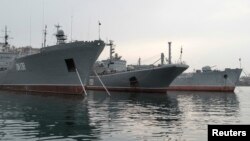 Russia's Large Landing Ship "Azov" (C) is pictured moored at the home base of Russia's Black Sea Fleet in the Crimean port of Sevastopol Feb. 24, 2014.