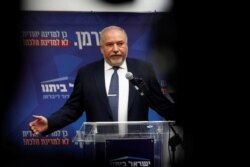 FILE - Avigdor Lieberman, head of the ultranationalist Yisrael Beitenu party, delivers a statement at the Knesset, Israeli parliament, in Jerusalem, Nov. 20, 2019.