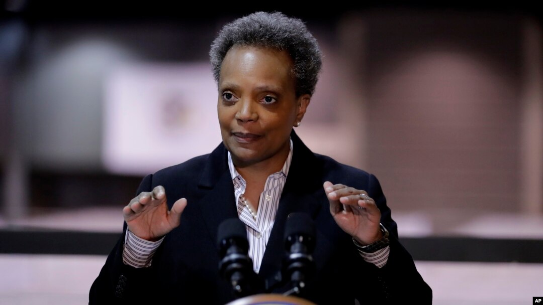 FILE - Chicago Mayor Lori Lightfoot speaks during a news conference in Hall A at the COVID-19 alternate site at McCormick Place in Chicago, April 10, 2020. 