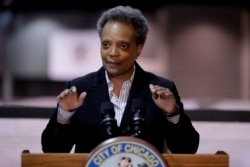 FILE - Chicago Mayor Lori Lightfoot speaks during a news conference in Hall A at the COVID-19 alternate site at McCormick Place in Chicago, April 10, 2020.