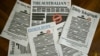 FILE - Front pages of major Australian newspapers show a "Your right to know" campaign, in Canberra, Australia, Oct. 21, 2019.