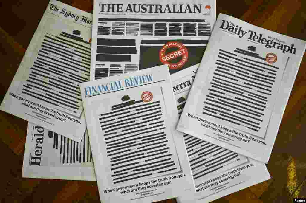 Front pages of major newspapers show a &#39;Your right to know&quot; campaign, in Canberra. Australia&#39;s biggest newspapers ran front pages made up to appear heavily redacted to protest against recent legislation that restricts press freedoms. (AAP Image)