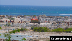 A truck prepares to dump trash at Jazeera Beach, one of the most popular beaches in Somalia's capital, Mogadishu. (Courtesy - Jamal Ali)