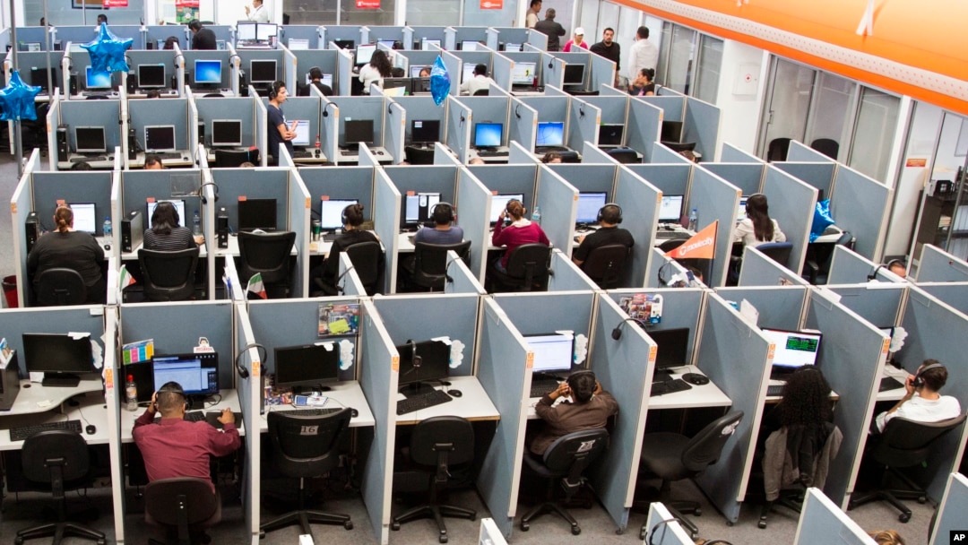 FILE - Workplaces have become high-stress spaces where many people feel overwhelmed, says Christine Porath, a Georgetown University management professor.