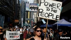 Pro-democracy activists take part in a protest on China's National Day in Hong Kong, China, Oct. 1, 2017. 