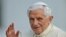 Pope Benedict XVI delivers his blessing as he arrives for a weekly general audience in St.Peter's Square at the Vatican, Oct. 3, 2012. 