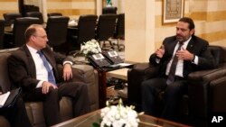 U.S. Treasury Assistant Secretary for Terrorist Financing, Marshall Billingslea, left, meets with Lebanese Prime Minister Saad Hariri, in Beirut, Lebanon, Sept. 23, 2019. 