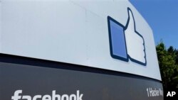 A sign at Facebook headquarters in Menlo Park, California, July 2013.