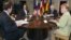 (From L) Spanish Prime Minister Mariano Rajoy, French President Francois Hollande, Italian Prime Minister Mario Monti and German Chancellor Angela Merkel attend a meeting at the Villa Madama in Rome, June 22, 2012.