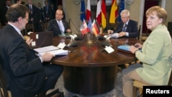 From left, Spanish Prime Minister Mariano Rajoy, French President Francois Hollande, Italian Prime Minister Mario Monti and German Chancellor Angela Merkel Villa Madama, Rome, June 22, 2012.