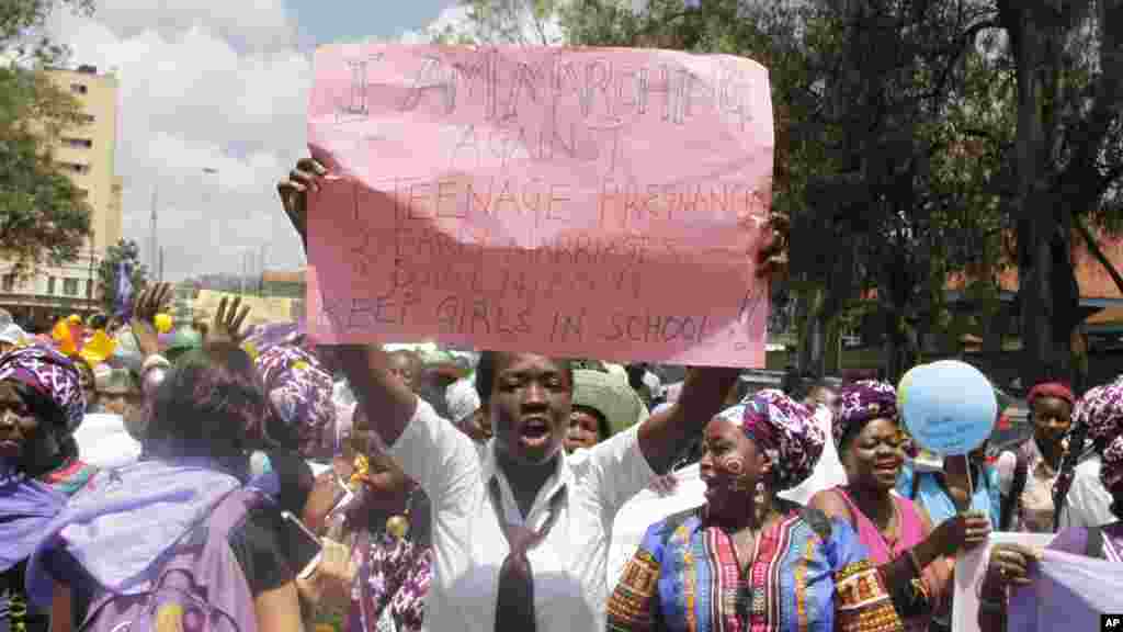 Women from Kenya, Uganda, Tanzania, Rwanda and Burundi participate in the world march of woman in Nairobi, Kenya