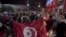Người dân Tunisia tuần hành, ngày 25/7/2021.