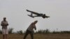 FILE - A drone is launched on a game reserve in South Africa, Feb. 15, 2016.