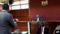 FILE — Kenya's Court judge Justice Chacha Mwita listens on petition against the deployment of Kenyan forces to Haiti, at Milimani court in the capital Nairobi, November 16, 2023.