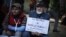 An elderly Indian participates in a protest against gender discrimination and sexual violence in New Delhi, India, Jan. 26, 2013. 
