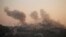 Smoke rises after explosion at smuggling tunnel dug beneath Gaza-Egypt border, southern Gaza Strip, Aug. 31, 2013.