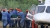 Jenazah yang diyakini sebagai Nora Anne Quorin, remaja berusia 15 tahun yang hilang, tiba setelah dievakuasi dengan helikopter di Seremban, Malaysia, Selasa, 13 Agustus 2019. (Foto: Reuters)