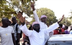 Supporters of newly elected President Umaro Sissoco Embalo celebrate, Jan. 1, 2020, in Bissau, Guinea-Bissau, after the anouncement of the election results.