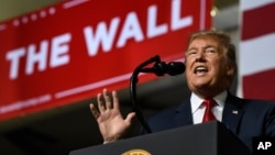 FILE - President Donald Trump speaks during a rally in El Paso, Texas, Feb. 11, 2019.