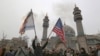 Iranians burn an Israeli and a U.S. flag during an anti-U.S. protest in the capital Tehran, Jan. 4, 2020, over the killings of Iranian military commander Qasem Soleimani and Iraqi paramilitary chief Abu Mahdi al-Muhandis.