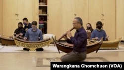 Priwan Nanongkhan teaches a group of American students in a Thai ensemble at Kent State University, OH. 