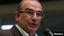 FILE - Colombia's lead government negotiator Humberto de la Calle addresses the media during a conference in Havana, March 21, 2013. 