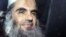 In this April 17, 2012 photo, Abu Qatada is driven away after being refused bail at a hearing at London's Special Immigration Appeals Commission, which handles deportation and security cases, in London.