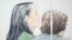 FILE - Huawei CFO Meng Wanzhou (L), who was arrested on an extradition warrant, appears at her B.C. Supreme Court bail hearing in a drawing in Vancouver, British Columbia, Canada, Dec. 10, 2018. 