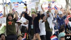 Supporters of the judges react to the Constitution Court ruling outside the court in Bangkok, Thailand, July 13, 2012. 