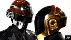 Thomas Bangalter, left, and Guy-Manuel de Homem-Christo, from the group Daft Punk pose for a portrait in Los Angeles, April 17, 2013.