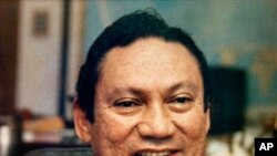 In this Nov. 8, 1989 file photo Panamanian military strongman Gen. Manuel Antonio Noriega talks to reporters in Panama City.