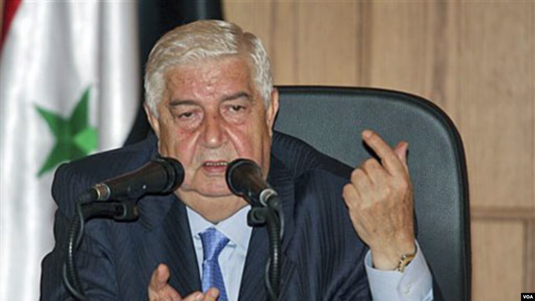 Menlu Suriah Walid Moallem mengecam sanksi-sanksi Uni Eropa dalam konferensi pers di Damaskus (22/6).