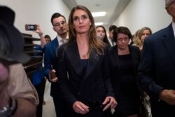 FILE - Former White House communications director Hope Hicks departs after a closed-door interview with the House Judiciary Committee on Capitol Hill in Washington, June 19, 2019.