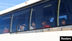 Migrants, mostly Venezuelans, are transported aboard a bus from Mexico's National Institute of Migration (INM) after being expelled from the United States through the Jeronimo-Santa Teresa border crossing in Ciudad Juarez, Mexico, Jan. 24, 2025. 