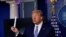 U.S. President Donald Trump shows a packaging containing a swab to be used for coronavirus disease (COVID-19) testing during the daily coronavirus task force briefing at the White House in Washington, U.S., April 19, 2020.
