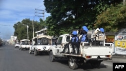 Members of United Nations Mission for Justice Support in Haiti patrol the streets of Port-au-Prince, on Nov. 21, 2018, during the third day of strikes.