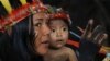 Members of an indigenous group from the Amazon region attend a meeting with Pope Francis at the Coliseo Regional Madre de Dios in Puerto Maldonado, Peru, Jan. 19, 2018. 