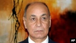 Dr. Mehmûd Abbas.