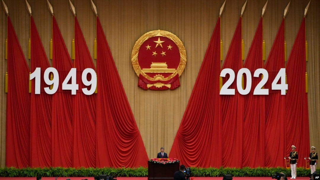 Chinese President Xi Jinping delivers his speech at a dinner marking the 75th anniversary of the founding of the People's Republic of China, at the Great Hall of the People in Beijing, Sept. 30, 2024. 