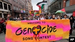 Pro-Palestinian demonstrators march during a protest against the participation of Israeli contestant Eden Golan ahead of the final of the Eurovision Song Contest in Malmo, Sweden, on May 11, 2024.