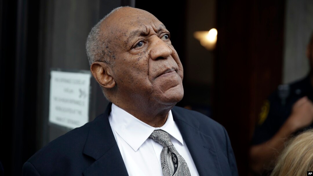 FILE - Bill Cosby exits the Montgomery County Courthouse after a mistrial was declared in Norristown, Pennsylvania, June 17, 2017.