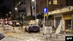 ისრაელის უსაფრთხოების ძალების წარმომადგენლები თელ-ავივის ქუჩებში, "ჰამასის" თავდასხმის შემდეგ. 7 ოქტომბერი, 2023.