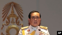 FILE - Gen. Prayuth Chan-ocha speaks at the start of his first press conference since Thursday's coup, May 26 , 2014. 