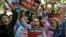 Activists of various Indian Muslim groups shout slogans against Indian prime minister Narendra Modi during a protest against the killing of a Muslim farmer, in New Delhi, India, Oct. 6, 2015.
